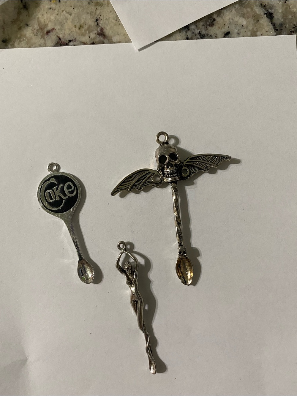 Silver-Tone Winged Skull and Spoon Charm Set in Silver and Black